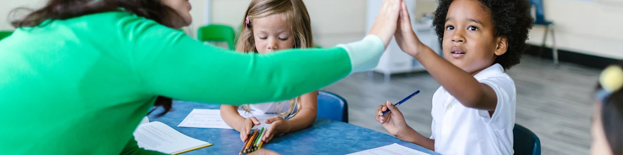 Image of an educator and child communicating - Top 15 behaviour management strategies for primary schools - Preview Image 